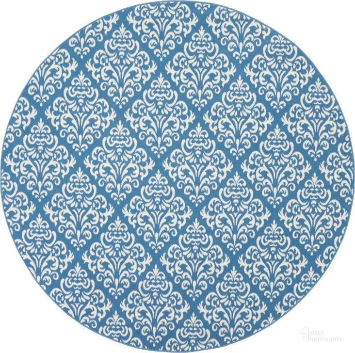 The appearance of Grafix Blue 8 Round Area Rug designed by Nourison in the transitional interior design. This blue piece of furniture  was selected by 1StopBedrooms from Grafix Collection to add a touch of cosiness and style into your home. Sku: 99446459121. Material: Polypropylene. Product Type: Area Rugs. Image1