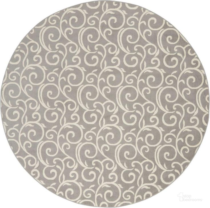 The appearance of Grafix Grey 8 Round Area Rug designed by Nourison in the modern / contemporary interior design. This grey piece of furniture  was selected by 1StopBedrooms from Grafix Collection to add a touch of cosiness and style into your home. Sku: 99446459190. Material: Polypropylene. Product Type: Area Rugs. Image1