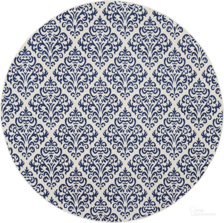 The appearance of Grafix White And Blue 8 Round Area Rug designed by Nourison in the transitional interior design. This white and blue piece of furniture  was selected by 1StopBedrooms from Grafix Collection to add a touch of cosiness and style into your home. Sku: 99446459114. Material: Polypropylene. Product Type: Area Rugs. Image1