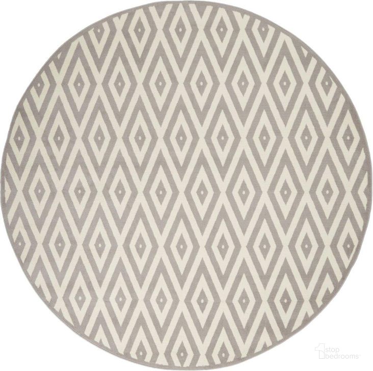 The appearance of Grafix White And Grey 8 Round Area Rug designed by Nourison in the modern / contemporary interior design. This white and grey piece of furniture  was selected by 1StopBedrooms from Grafix Collection to add a touch of cosiness and style into your home. Sku: 99446719560. Material: Polypropylene. Product Type: Area Rugs. Image1