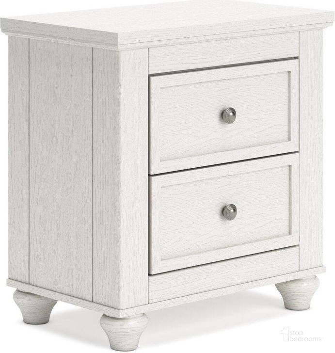 The appearance of Grantoni White Two Drawer Nightstand designed by Signature Design by Ashley in the traditional interior design. This white piece of furniture  was selected by 1StopBedrooms from Grantoni Collection to add a touch of cosiness and style into your home. Sku: B3290-92. Material: Wood. Product Type: Nightstand. Image1