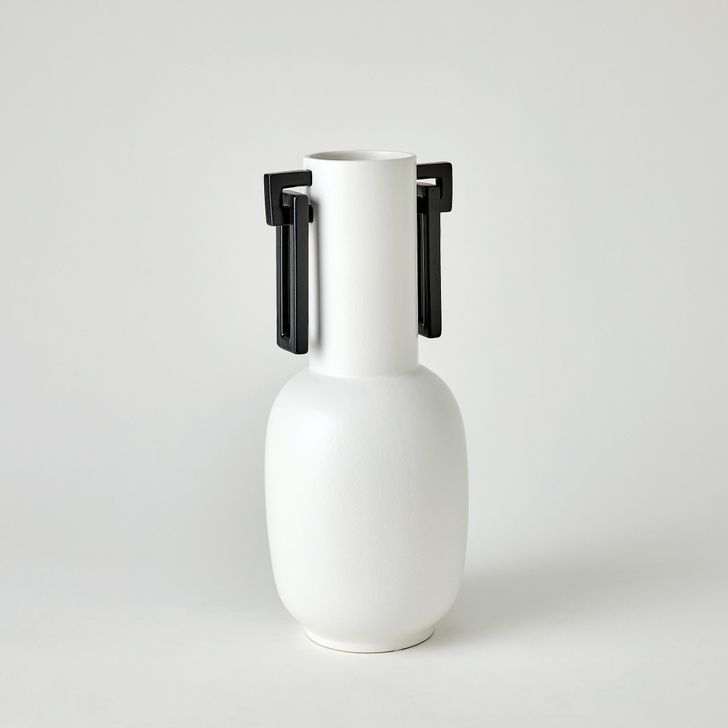 The appearance of Grecian Handled Vase In Matte White designed by Global Views in the modern / contemporary interior design. This black piece of furniture  was selected by 1StopBedrooms from Grecian Collection to add a touch of cosiness and style into your home. Sku: 1.1091. Material: Ceramic. Product Type: Vase. Image1