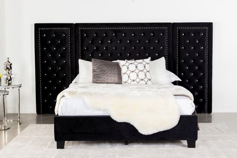 The appearance of Hailey Upholstered Platform Eastern King Bed With Wall Panel Black designed by Coaster in the modern / contemporary interior design. This black piece of furniture  was selected by 1StopBedrooms from Hailey Collection to add a touch of cosiness and style into your home. Sku: 315925KE;315925P. Bed Type: Platform Bed. Product Type: Platform Bed. Bed Size: King. Image1