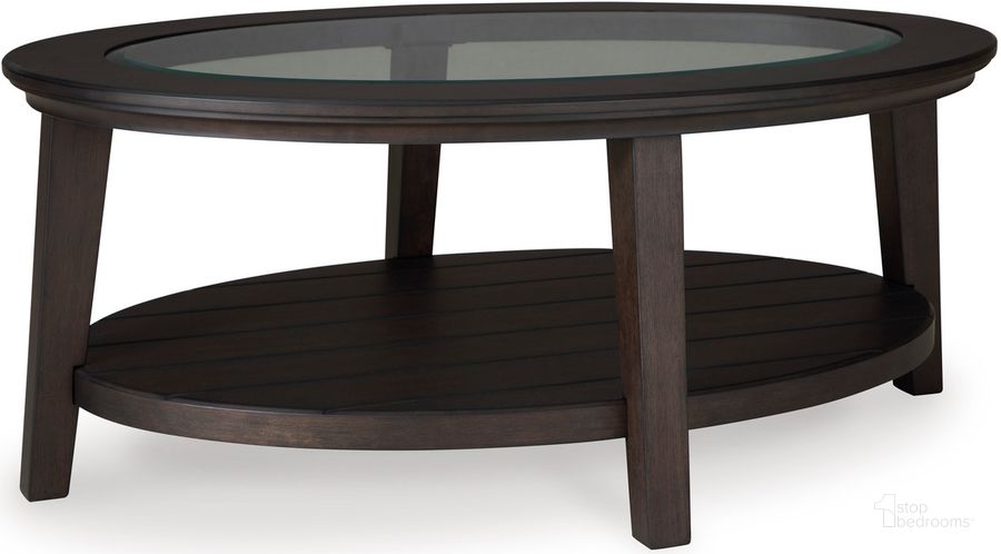 The appearance of Halfway Cove Dark Brown Coffee and Cocktail Table designed by Bennett Interiors in the transitional interior design. This dark brown piece of furniture  was selected by 1StopBedrooms from Halfway Cove Collection to add a touch of cosiness and style into your home. Sku: T429-0. Material: Glass. Product Type: Coffee Table. Image1