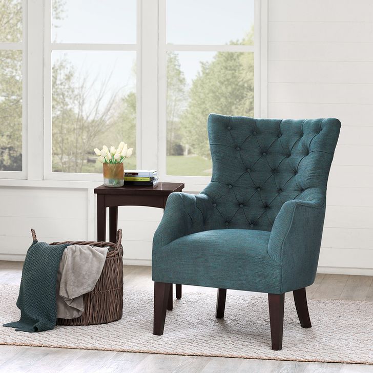 The appearance of Hannah Button Tufted Wing Chair In Teal designed by Olliix in the transitional interior design. This teal piece of furniture  was selected by 1StopBedrooms from Hannah Collection to add a touch of cosiness and style into your home. Sku: FPF18-0403. Material: Wood. Product Type: Accent Chair. Image1