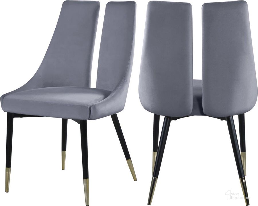 The appearance of Hansford Grey Velvet Dining Chair Set of 2 designed by Furnique in the modern / contemporary interior design. This grey velvet piece of furniture  was selected by 1StopBedrooms from Hansford Collection to add a touch of cosiness and style into your home. Sku: 944Grey-C. Product Type: Dining Chair. Material: Iron. Image1