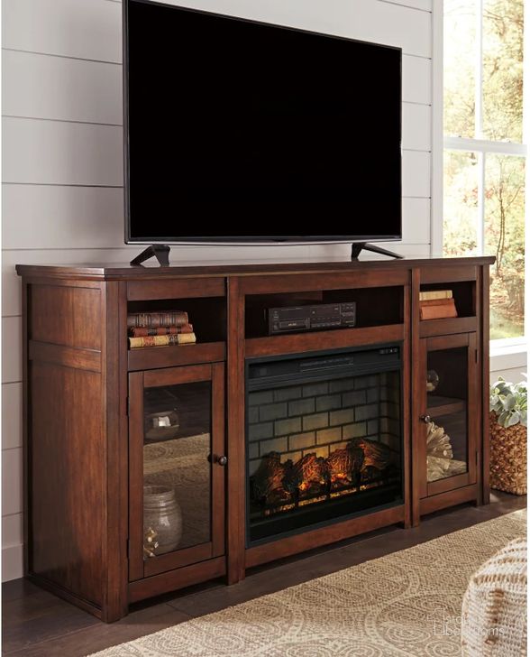 The appearance of Harpan Reddish Brown 72" TV Stand with Fireplace designed by Signature Design by Ashley in the traditional interior design. This reddish brown piece of furniture  was selected by 1StopBedrooms from Harpan Collection to add a touch of cosiness and style into your home. Sku: W797-68;W100-121. Material: Wood. Product Type: TV Stands and TV Console. Image1