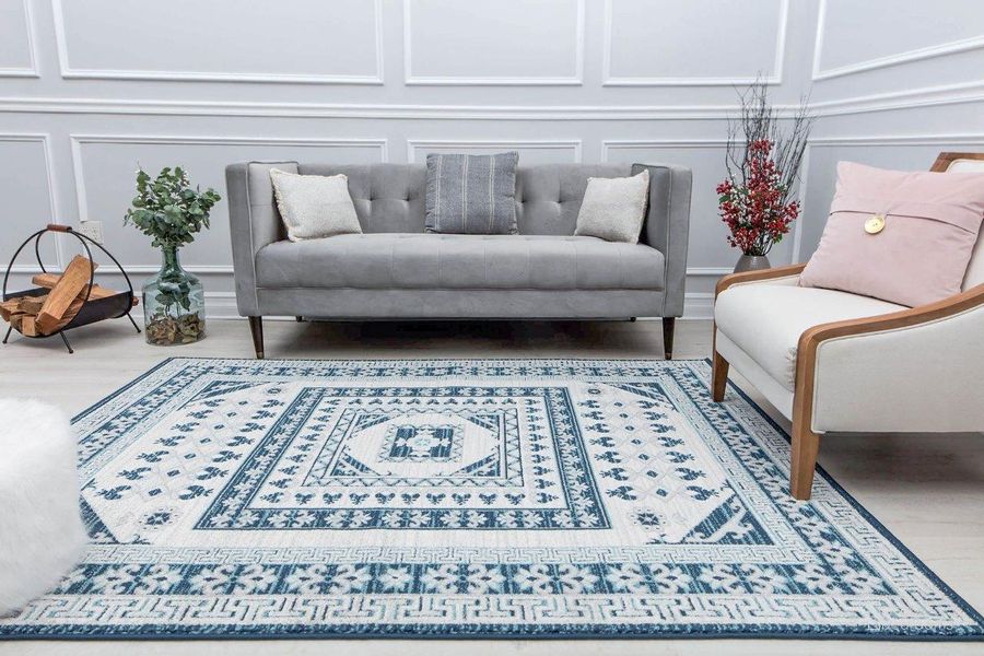 The appearance of Harper HY40F Evening Blue Abstract Vintage Blue 5' x 7' Area Rug designed by Rugs America in the rustic / southwestern interior design. This blue piece of furniture  was selected by 1StopBedrooms from Harper Collection to add a touch of cosiness and style into your home. Sku: RA30911. Material: Polypropylene. Product Type: Area Rugs. Image1