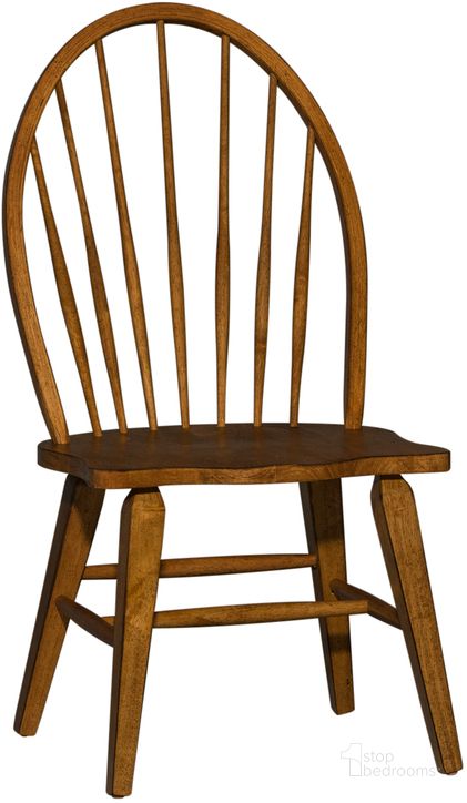 The appearance of Hearthstone Rustic Oak Windsor Back Side Chair set of 2 designed by Liberty in the country / farmhouse interior design. This brown piece of furniture  was selected by 1StopBedrooms from Hearthstone Collection to add a touch of cosiness and style into your home. Sku: 382-C1000S. Material: Wood. Product Type: Side Chair. Image1