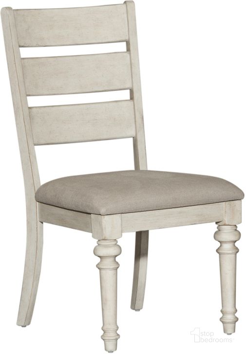 The appearance of Heartland Antique White Ladder Back Side Chair Set of 2 designed by Liberty in the country / farmhouse interior design. This white piece of furniture  was selected by 1StopBedrooms from Heartland Collection to add a touch of cosiness and style into your home. Sku: 824-C2001S. Product Type: Side Chair. Material: Rubberwood. Image1