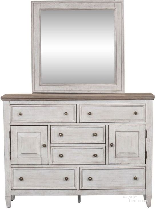 The appearance of Heartland Dresser And Mirror In White designed by Liberty in the country / farmhouse interior design. This white piece of furniture  was selected by 1StopBedrooms from Heartland Collection to add a touch of cosiness and style into your home. Sku: 824-BR31;824-BR51. Product Type: Dresser and Mirror. Material: Rubberwood. Image1