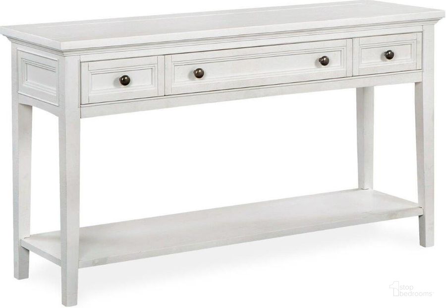 The appearance of Heron Cove Chalk White Rectangle Sofa Table designed by Magnussen in the transitional interior design. This white piece of furniture  was selected by 1StopBedrooms from Heron Cove Collection to add a touch of cosiness and style into your home. Sku: T4400-73. Product Type: Sofa Table. Image1