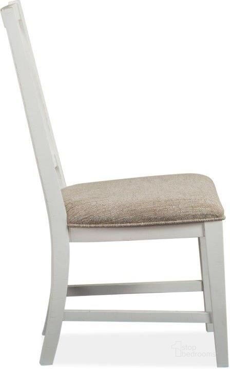 The appearance of Heron Cove Chalk White Wood Dining Side Chair with Upholstered Seat Set of 2 KD designed by Magnussen in the coastal interior design. This white piece of furniture  was selected by 1StopBedrooms from Heron Cove Collection to add a touch of cosiness and style into your home. Sku: D4400-62. Material: Wood. Product Type: Side Chair. Image1