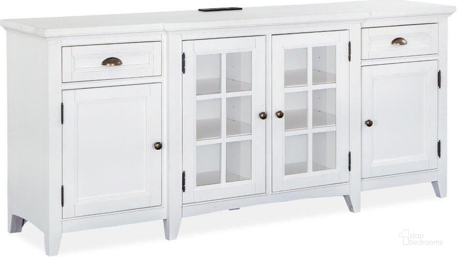 The appearance of Heron Cove Chalk White Wood 70 Inch Console designed by Magnussen in the modern / contemporary interior design. This white piece of furniture  was selected by 1StopBedrooms from Heron Cove Collection to add a touch of cosiness and style into your home. Sku: E4400-05. Product Type: Entertainment Console. Image1