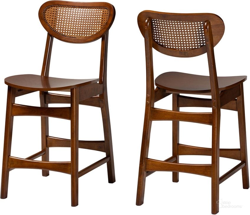 The appearance of Hesper Counter Stool Set of 2 In Walnut Brown Finished Wood and Rattan designed by Baxton Studio in the transitional interior design. This walnut and light brown piece of furniture  was selected by 1StopBedrooms from Hesper Collection to add a touch of cosiness and style into your home. Sku: RH253P-Walnut Rattan/Walnut Bent Seat-PC-2PK. Product Type: Barstool. Material: Rubberwood. Image1