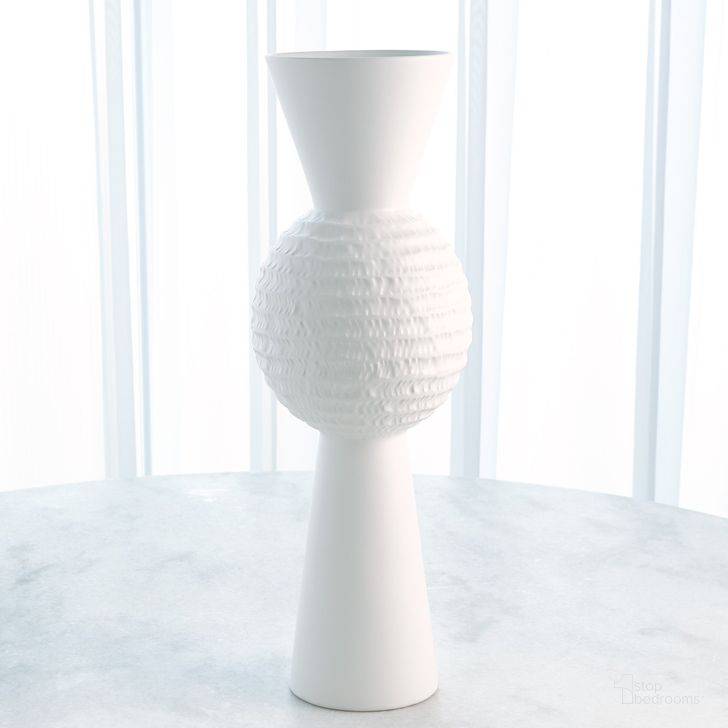 The appearance of High Chiseled Orb Large Vase In Matte White designed by Global Views in the modern / contemporary interior design. This white piece of furniture  was selected by 1StopBedrooms from High Collection to add a touch of cosiness and style into your home. Sku: 1.10812. Material: Ceramic. Product Type: Vase. Image1