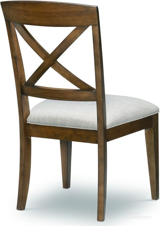The appearance of Highland Saddle Brown X Back Side Chair Set Of 2 designed by Legacy Classic in the transitional interior design. This brown and gray piece of furniture  was selected by 1StopBedrooms from Highland Collection to add a touch of cosiness and style into your home. Sku: 9700-140. Product Type: Dining Chair. Material: Rubberwood. Image1