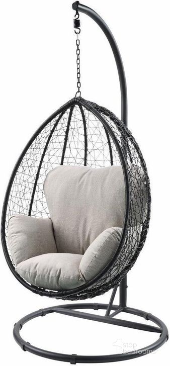 The appearance of Homeroots Beige Fabric And Black Wicker Patio Swing Chair With Stand designed by Homeroots in the modern / contemporary interior design. This beige piece of furniture  was selected by 1StopBedrooms from  to add a touch of cosiness and style into your home. Sku: 318800. Material: Steel. Product Type: Living Room Chair. Image1