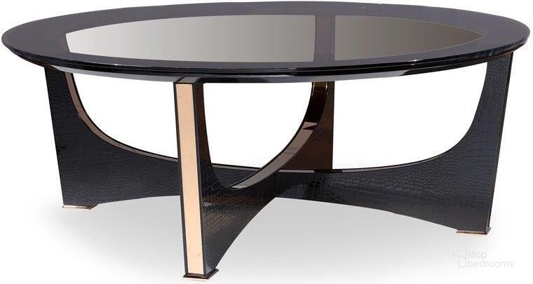 The appearance of Homeroots Black Crocodile Tex Tures And Rosegold And Glass Coffee Table 284165 designed by Homeroots in the modern / contemporary interior design. This black piece of furniture  was selected by 1StopBedrooms from Crocodile Collection to add a touch of cosiness and style into your home. Sku: 284165. Material: Glass. Product Type: Coffee Table. Image1
