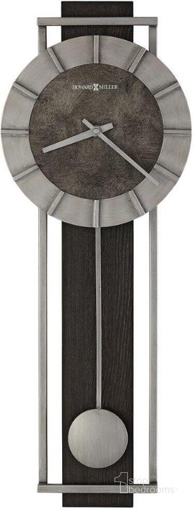 The appearance of Howard Miller Oscar Wall Clock designed by Howard Miller in the modern / contemporary interior design. This gray piece of furniture  was selected by 1StopBedrooms from Oscar Collection to add a touch of cosiness and style into your home. Sku: 625692. Product Type: Wall Clock. Image1