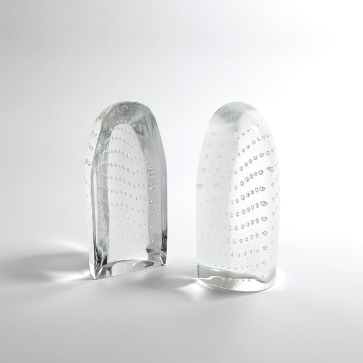 The appearance of Iceberg Bookends In Dewdrop Clear designed by Global Views in the modern / contemporary interior design. This clear piece of furniture  was selected by 1StopBedrooms from Iceberg Collection to add a touch of cosiness and style into your home. Sku: BB-6.60009. Material: Glass. Product Type: Bookends. Image1