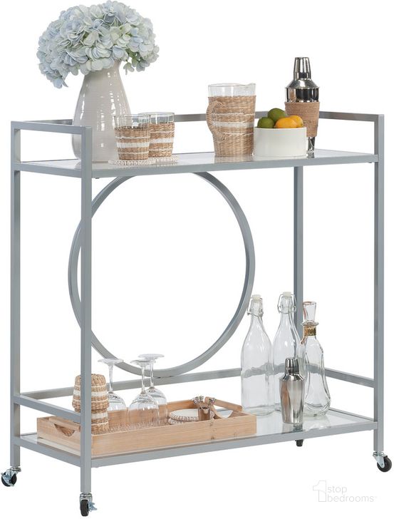 The appearance of International Lux Bar Cart In Silver designed by Sauder in the transitional interior design. This silver piece of furniture  was selected by 1StopBedrooms from International Lux Collection to add a touch of cosiness and style into your home. Sku: 433831. Material: Metal. Product Type: Bar Cart. Image1