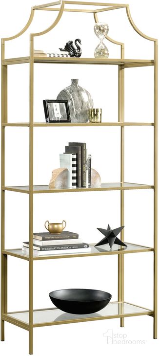 The appearance of International Lux Bookcase In Satin Gold designed by Sauder in the modern / contemporary interior design. This satin gold piece of furniture  was selected by 1StopBedrooms from International Lux Collection to add a touch of cosiness and style into your home. Sku: 421434. Material: Metal. Product Type: Bookcase. Image1