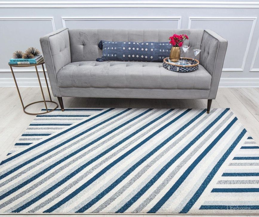 The appearance of Isaac Mizrahi Ja x on CM60A Beveled Blue Geometric Contemporary Blue 2' x 4' Area Rug designed by Rugs America in the modern / contemporary interior design. This blue piece of furniture  was selected by 1StopBedrooms from Jaxon Collection to add a touch of cosiness and style into your home. Sku: RA32138. Material: Polypropylene. Product Type: Area Rugs. Image1
