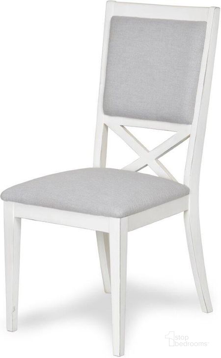 The appearance of Islamorada Upholstered Dining Chair In White And Grey designed by Sea Winds Trading in the  interior design. This white and grey piece of furniture  was selected by 1StopBedrooms from  to add a touch of cosiness and style into your home. Sku: D23381-BLANC. Material: Wood. Product Type: Dining Chair. Image1