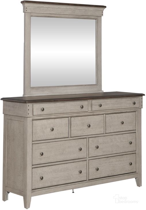 The appearance of Ivy Hollow Dresser And Mirror In White designed by Liberty in the country / farmhouse interior design. This white piece of furniture  was selected by 1StopBedrooms from Ivy Hollow Collection to add a touch of cosiness and style into your home. Sku: 457-BR31;457-BR51. Product Type: Dresser and Mirror. Material: Poplar. Image1