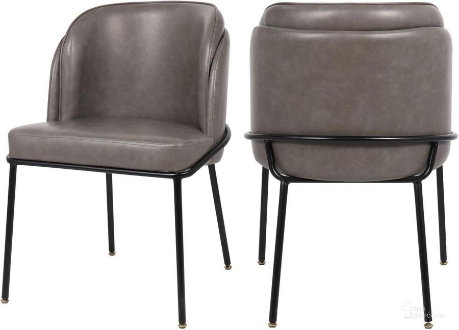 The appearance of Jagger Grey Faux Leather Dining Chair Set Of 2 designed by Meridian in the modern / contemporary interior design. This grey faux leather piece of furniture  was selected by 1StopBedrooms from Jagger Collection to add a touch of cosiness and style into your home. Sku: 883Grey-C. Material: Metal. Product Type: Dining Chair. Image1