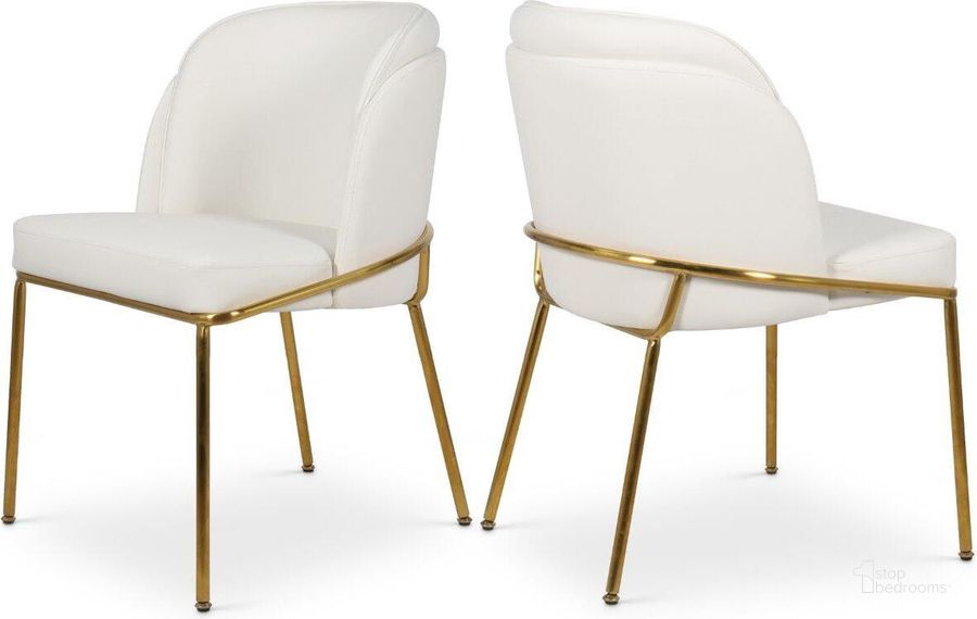 The appearance of Jagger White Faux Leather Dining Chair Set of 2 designed by Meridian in the modern / contemporary interior design. This white faux leather piece of furniture  was selected by 1StopBedrooms from Jagger Collection to add a touch of cosiness and style into your home. Sku: 882White-C. Product Type: Dining Chair. Material: Iron. Image1