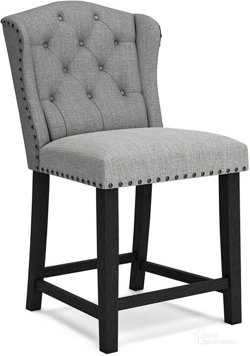 The appearance of Jeanette Gray Upholstered Barstool Set Of 2 designed by Signature Design by Ashley in the transitional interior design. This gray piece of furniture  was selected by 1StopBedrooms from Jeanette Collection to add a touch of cosiness and style into your home. Sku: D702-224. Material: Fabric. Product Type: Barstool. Image1