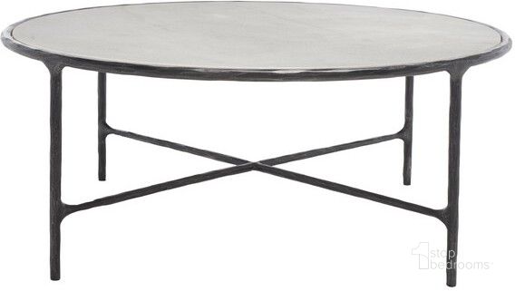 The appearance of Jessa Round Metal Coffee Table In Black And White designed by Safavieh Couture in the glam interior design. This black and white piece of furniture  was selected by 1StopBedrooms from Jessa Collection to add a touch of cosiness and style into your home. Sku: SFV9501D. Product Type: Coffee Table. Material: MDF. Image1