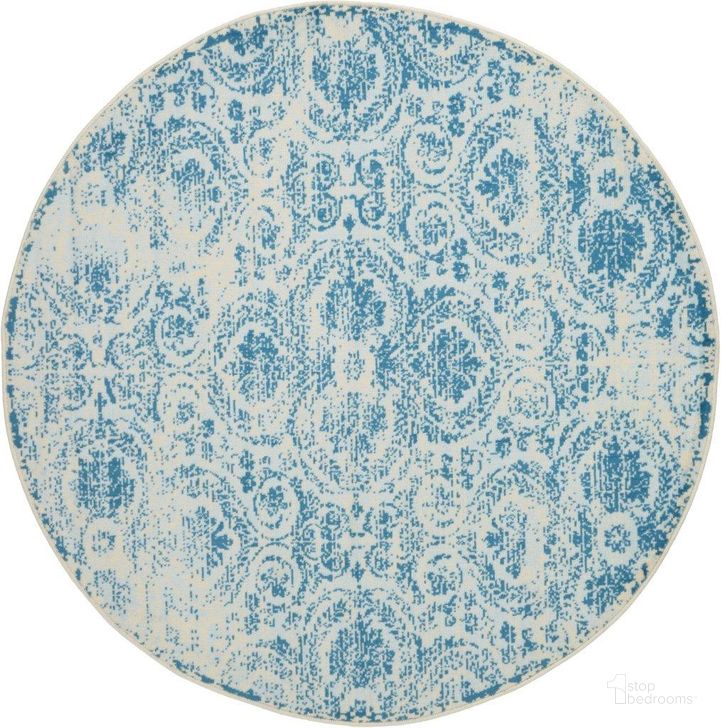 The appearance of Jubilant Blue 5 Round Area Rug designed by Nourison in the transitional interior design. This blue piece of furniture  was selected by 1StopBedrooms from Jubilant Collection to add a touch of cosiness and style into your home. Sku: 99446478092. Material: Polypropylene. Product Type: Area Rugs. Image1