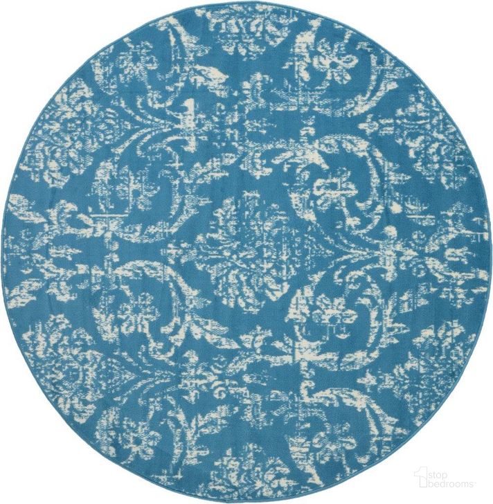 The appearance of Jubilant Blue 5 Round Area Rug designed by Nourison in the transitional interior design. This blue piece of furniture  was selected by 1StopBedrooms from Jubilant Collection to add a touch of cosiness and style into your home. Sku: 99446478696. Material: Polypropylene. Product Type: Area Rugs. Image1