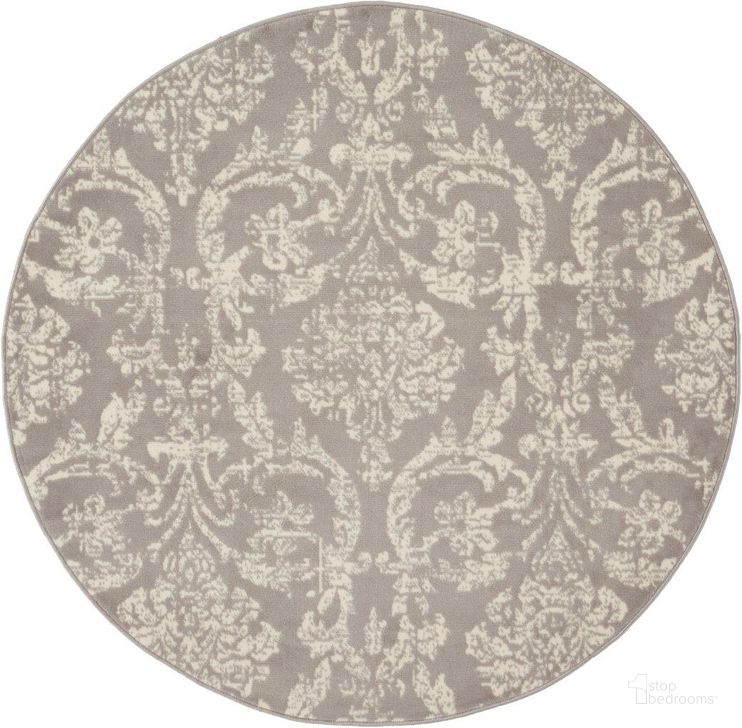 The appearance of Jubilant Grey 5 Round Area Rug designed by Nourison in the transitional interior design. This grey piece of furniture  was selected by 1StopBedrooms from Jubilant Collection to add a touch of cosiness and style into your home. Sku: 99446478924. Material: Polypropylene. Product Type: Area Rugs. Image1
