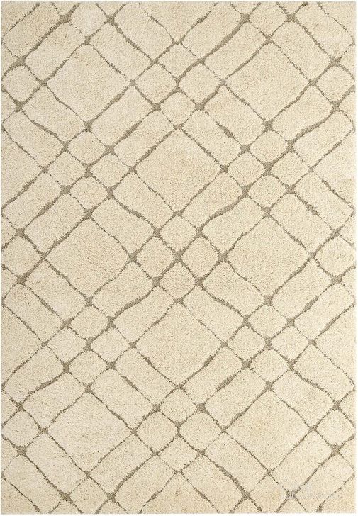 The appearance of Jubilant Verona Abstract Geometric 5X8 Shag Area Rug In Creame and Beige designed by Modway in the modern / contemporary interior design. This creame and beige piece of furniture  was selected by 1StopBedrooms from Jubilant Collection to add a touch of cosiness and style into your home. Sku: R-1149A-58. Material: Polypropylene. Product Type: Area Rugs. Image1