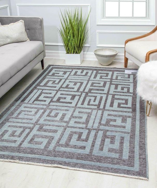 The appearance of Kai KI20A Graphic Gunmetal Transitional Vintage Blue 8' x 10' Area Rug designed by Rugs America in the transitional interior design. This blue piece of furniture  was selected by 1StopBedrooms from Kai Collection to add a touch of cosiness and style into your home. Sku: RA30285. Material: Polyester. Product Type: Area Rugs. Image1