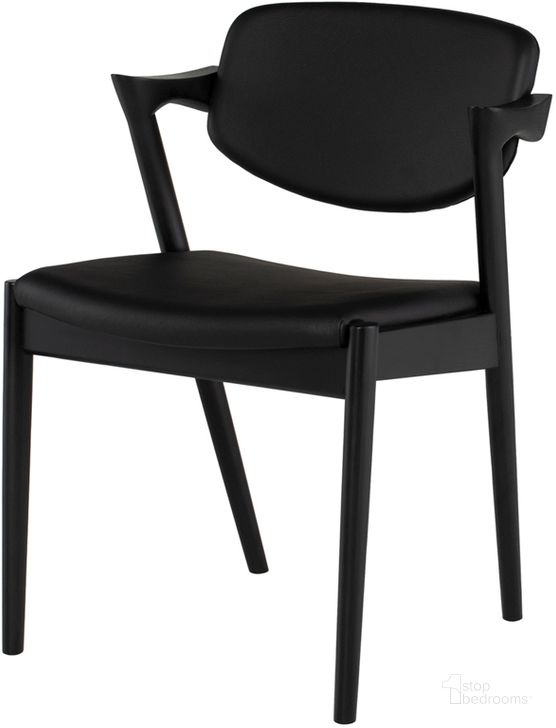 The appearance of Kalli Black Naugahyde Dining Chair designed by Nuevo in the modern / contemporary interior design. This black piece of furniture  was selected by 1StopBedrooms from Kalli Collection to add a touch of cosiness and style into your home. Sku: HGEM875. Product Type: Dining Chair. Material: Naugahyde. Image1