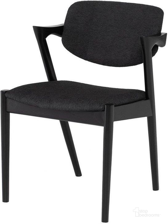 The appearance of Kalli Dining Chair In Activated Charcoal designed by Nuevo in the modern / contemporary interior design. This charcoal piece of furniture  was selected by 1StopBedrooms from Kalli Collection to add a touch of cosiness and style into your home. Sku: HGNH108. Material: Fabric. Product Type: Dining Chair. Image1