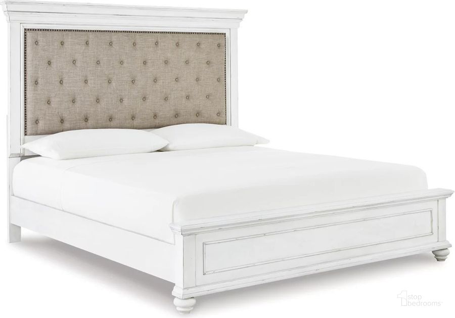 The appearance of Kanwyn Queen Panel Bed In White Wash designed by Signature Design by Ashley in the transitional interior design. This white wash piece of furniture  was selected by 1StopBedrooms from Kanwyn Collection to add a touch of cosiness and style into your home. Sku: B777-54;B777-96;B777-157. Bed Type: Panel Bed. Material: Fabric. Product Type: Panel Bed. Bed Size: Queen. Image1