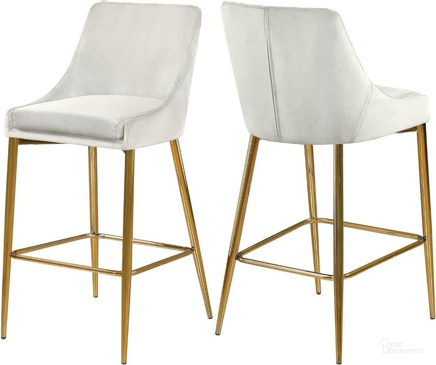 The appearance of Karina Cream Velvet Stool Set of 2 designed by Meridian in the modern / contemporary interior design. This cream velvet piece of furniture  was selected by 1StopBedrooms from Karina Collection to add a touch of cosiness and style into your home. Sku: 789Cream-C. Product Type: Counter Height Chair. Material: Velvet. Image1