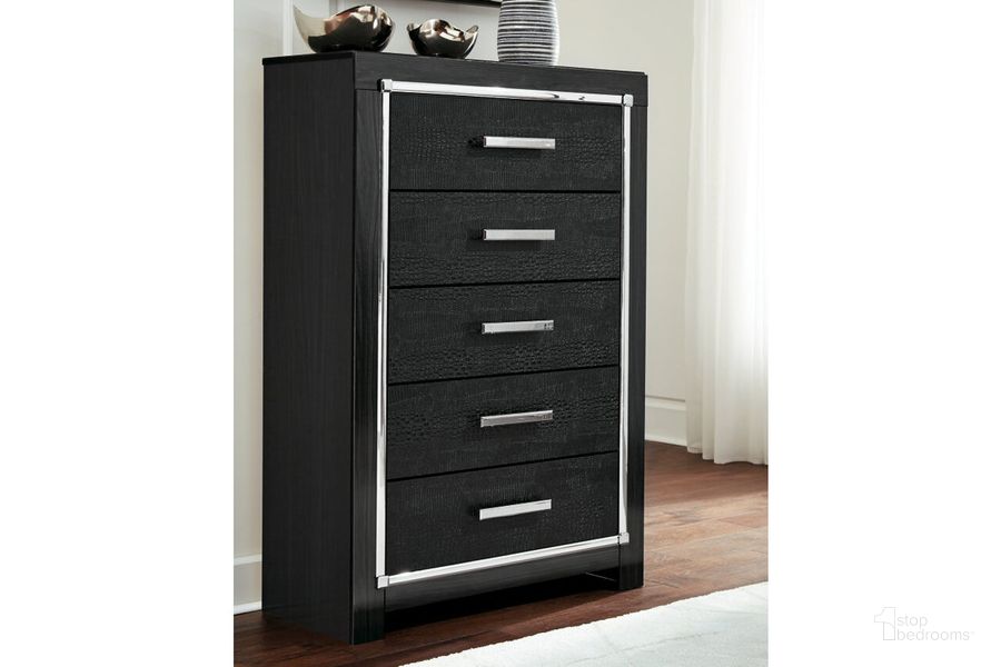 The appearance of Kaydell Black Five Drawer Chest designed by Signature Design by Ashley in the modern / contemporary interior design. This black piece of furniture  was selected by 1StopBedrooms from Kaydell Collection to add a touch of cosiness and style into your home. Sku: B1420-46. Material: Wood. Product Type: Chest. Image1