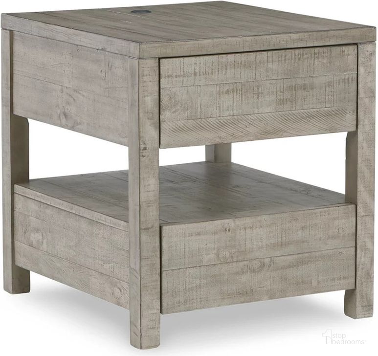 The appearance of Krystanza Weathered Gray Rectangular End Table designed by Signature Design by Ashley in the modern / contemporary interior design. This weathered gray piece of furniture  was selected by 1StopBedrooms from Krystanza Collection to add a touch of cosiness and style into your home. Sku: T990-3. Material: Wood. Product Type: End Table. Image1