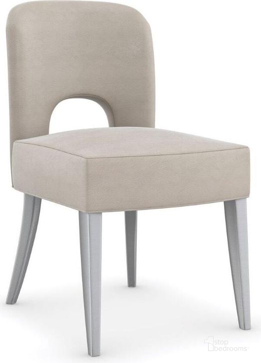 The appearance of Caracole Modern La Moda Side Chair designed by Caracole in the transitional interior design. This beige piece of furniture  was selected by 1StopBedrooms from La Moda Collection to add a touch of cosiness and style into your home. Sku: M132-421-281. Material: Wood. Product Type: Dining Chair. Image1