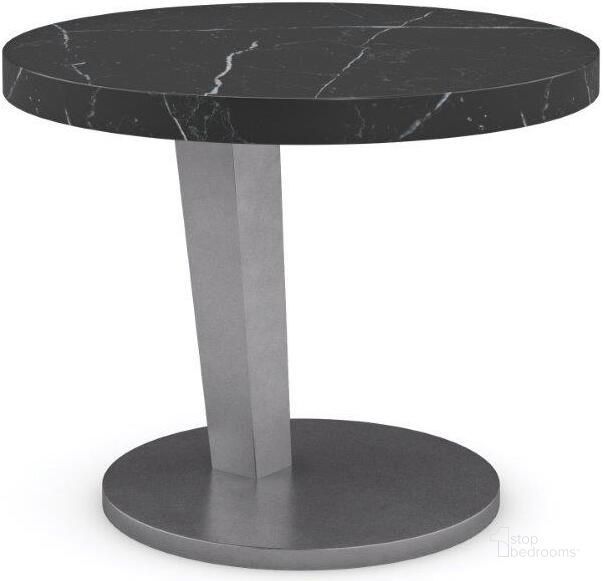 The appearance of Caracole Modern La Moda Short Spot Table designed by Caracole in the transitional interior design. This silver and black piece of furniture  was selected by 1StopBedrooms from La Moda Collection to add a touch of cosiness and style into your home. Sku: M131-421-422. Material: Metal. Product Type: End Table. Image1