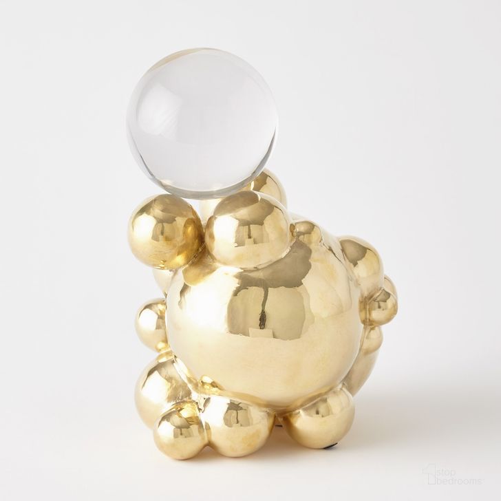 The appearance of Large Bubble Orb Holder In Brass With Crystal Sphere designed by Global Views in the modern / contemporary interior design. This brass piece of furniture  was selected by 1StopBedrooms from Bubble Collection to add a touch of cosiness and style into your home. Sku: 8.83067. Product Type: Decorative Accessory. Material: Brass. Image1