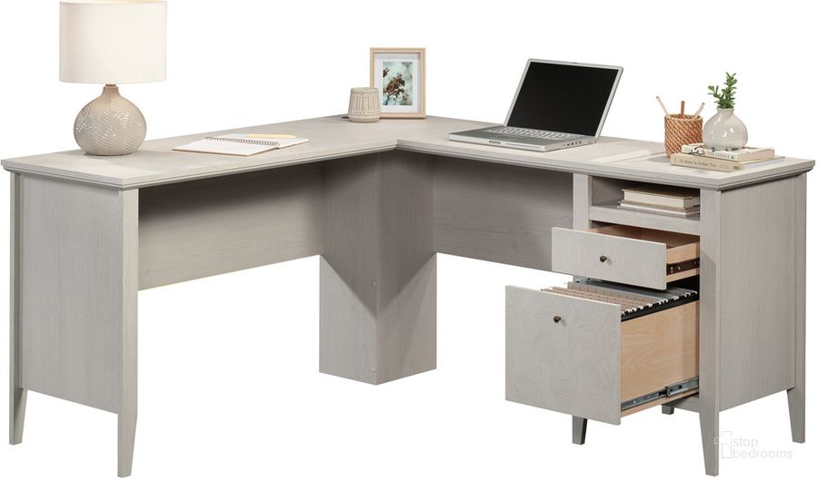 The appearance of Larkin Ledge L-Shaped Desk In Glacier Oak designed by Sauder in the modern / contemporary interior design. This glacier oak piece of furniture  was selected by 1StopBedrooms from Larkin Ledge Collection to add a touch of cosiness and style into your home. Sku: 433588. Product Type: Desk. Material: Engineered Wood. Image1