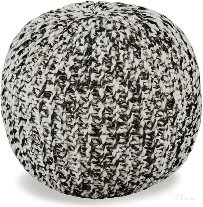The appearance of Latricia Black/White Pouf designed by Signature Design by Ashley in the transitional interior design. This black/white piece of furniture  was selected by 1StopBedrooms from Latricia Collection to add a touch of cosiness and style into your home. Sku: A1000828. Material: Fabric. Product Type: Ottoman. Image1